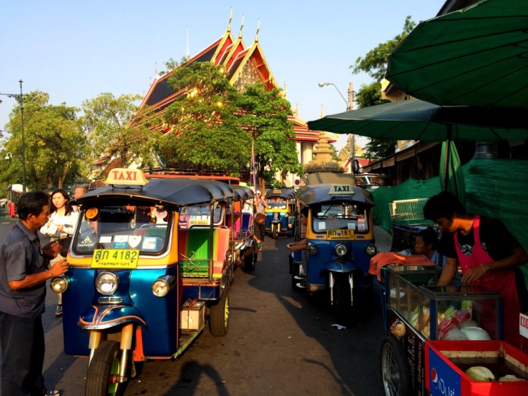 A line of waiting Tuk Tuks in front of Wat Pho.